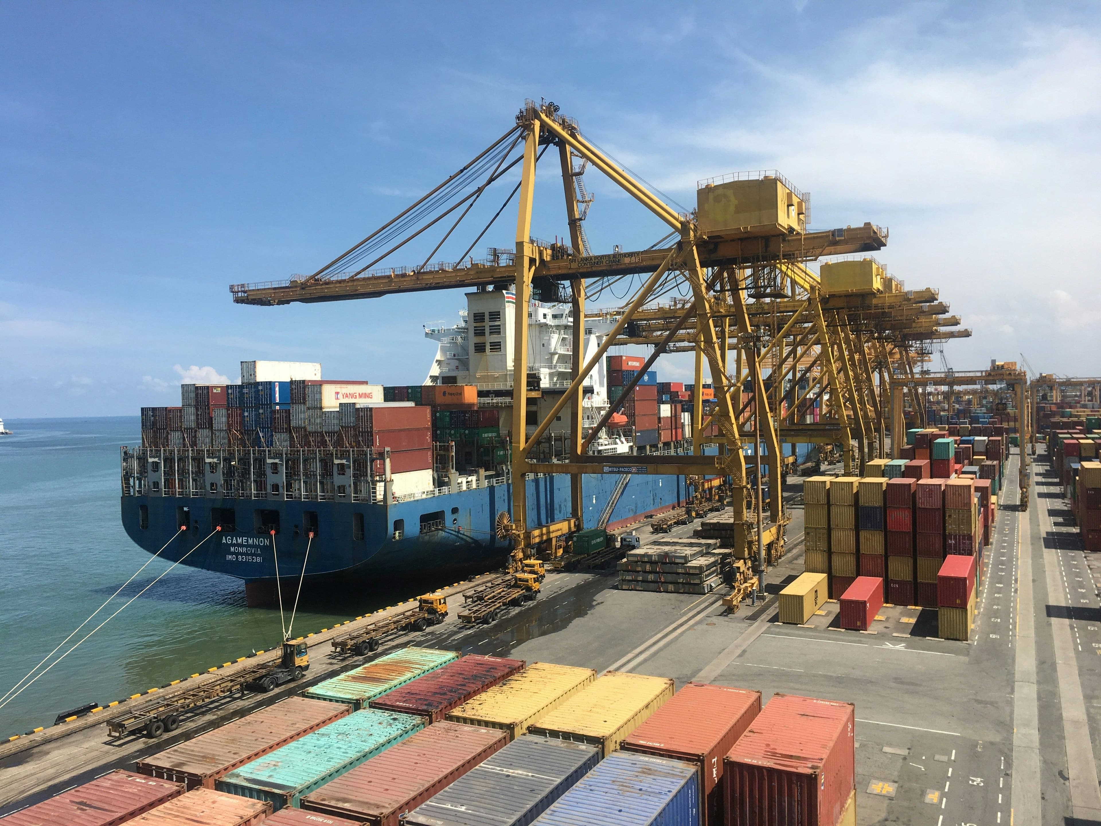 Container ship and cargo plane aerial view